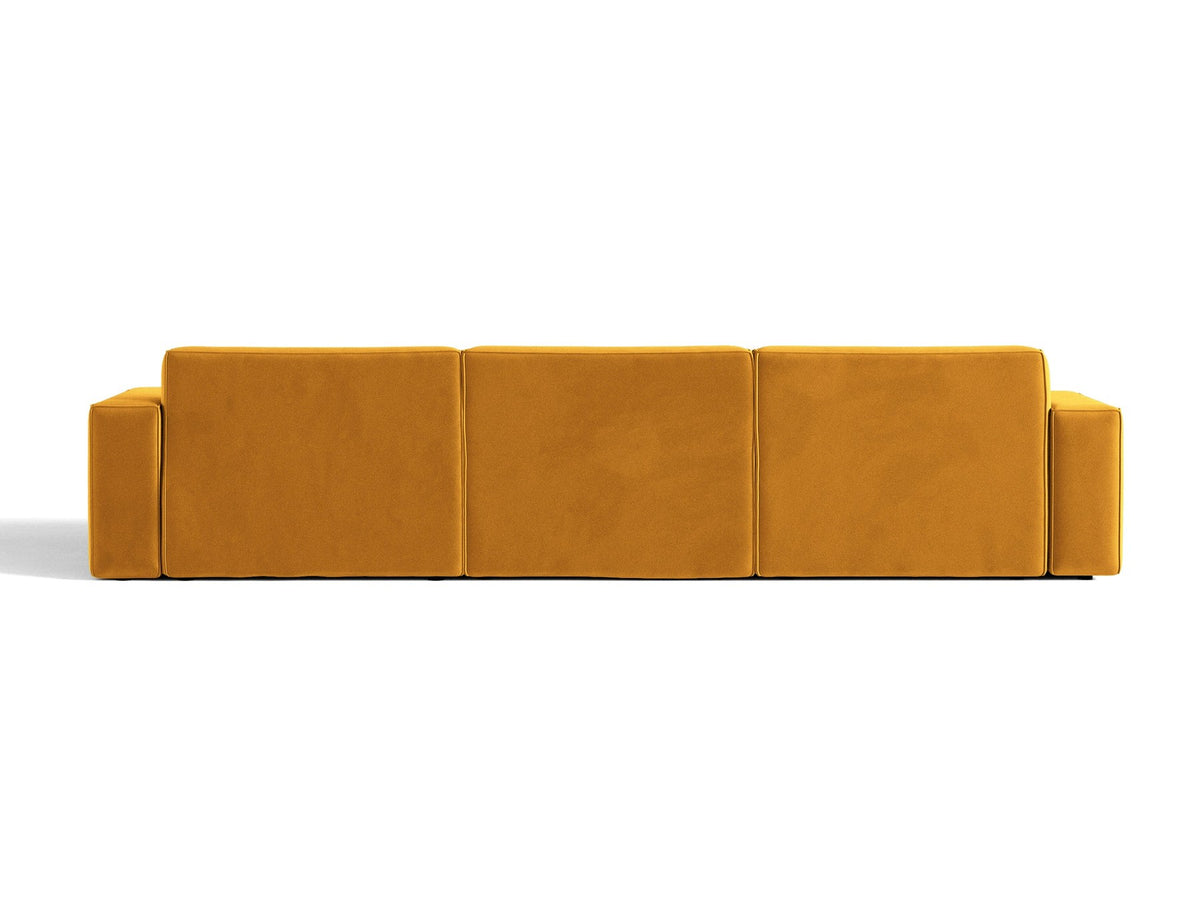 Modulares Ecksofa links von Micadoni in leichtem Beige mit Venus-Samtstoff-Bezug, schwarzen Kunststoffbeinen und niedriger Rückenlehne.