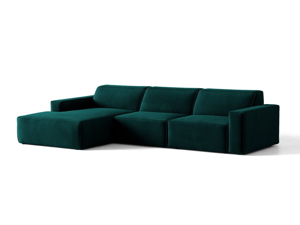 Modulares Ecksofa links von Micadoni in leichtem Beige mit Venus-Samtstoff-Bezug, schwarzen Kunststoffbeinen und niedriger Rückenlehne.