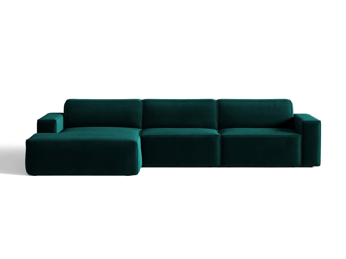 Modulares Ecksofa links von Micadoni in leichtem Beige mit Venus-Samtstoff-Bezug, schwarzen Kunststoffbeinen und niedriger Rückenlehne.