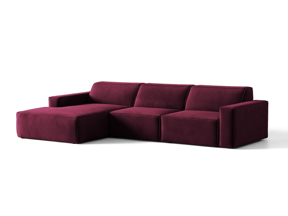 Modulares Ecksofa links von Micadoni in leichtem Beige mit Venus-Samtstoff-Bezug, schwarzen Kunststoffbeinen und niedriger Rückenlehne.