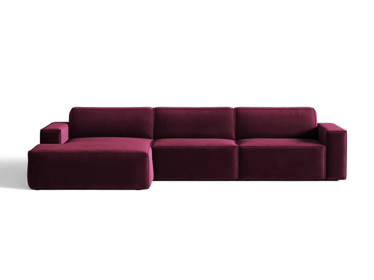 Modulares Ecksofa links von Micadoni in leichtem Beige mit Venus-Samtstoff-Bezug, schwarzen Kunststoffbeinen und niedriger Rückenlehne.