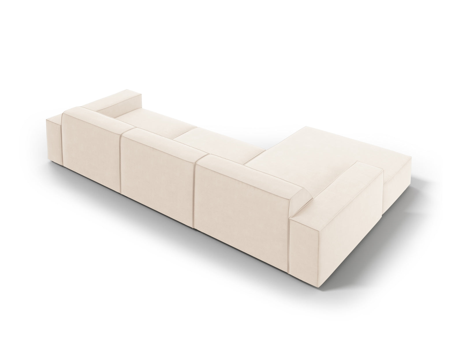 Modulares Jodie Velour Ecksofa in sanftem Beige, perfekt für gemütliche Abende. Bietet Platz für vier Personen und fügt sich harmonisch in jedes Wohnzimmer ein.