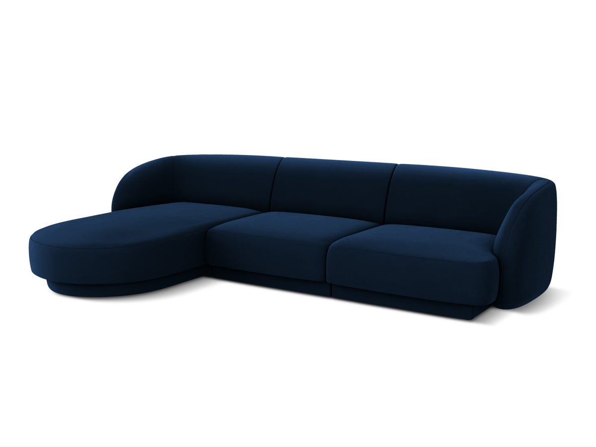 Miley Velour Ecksofa links 4 Sitzer in Royal Blue-Bluvel präsentiert im Onlineshop von KAQTU Design AG. L-Sofa links ist von Micadoni