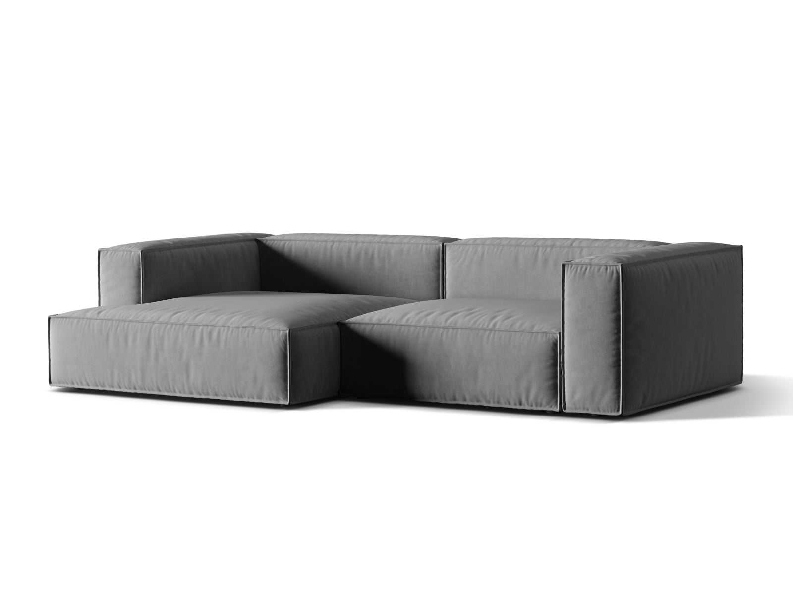 Elegantes Nuria Velour Ecksofa in Grau, modular und linksseitig, ideal für stilvolle Wohnräume. 4-Sitzer von Micadoni.