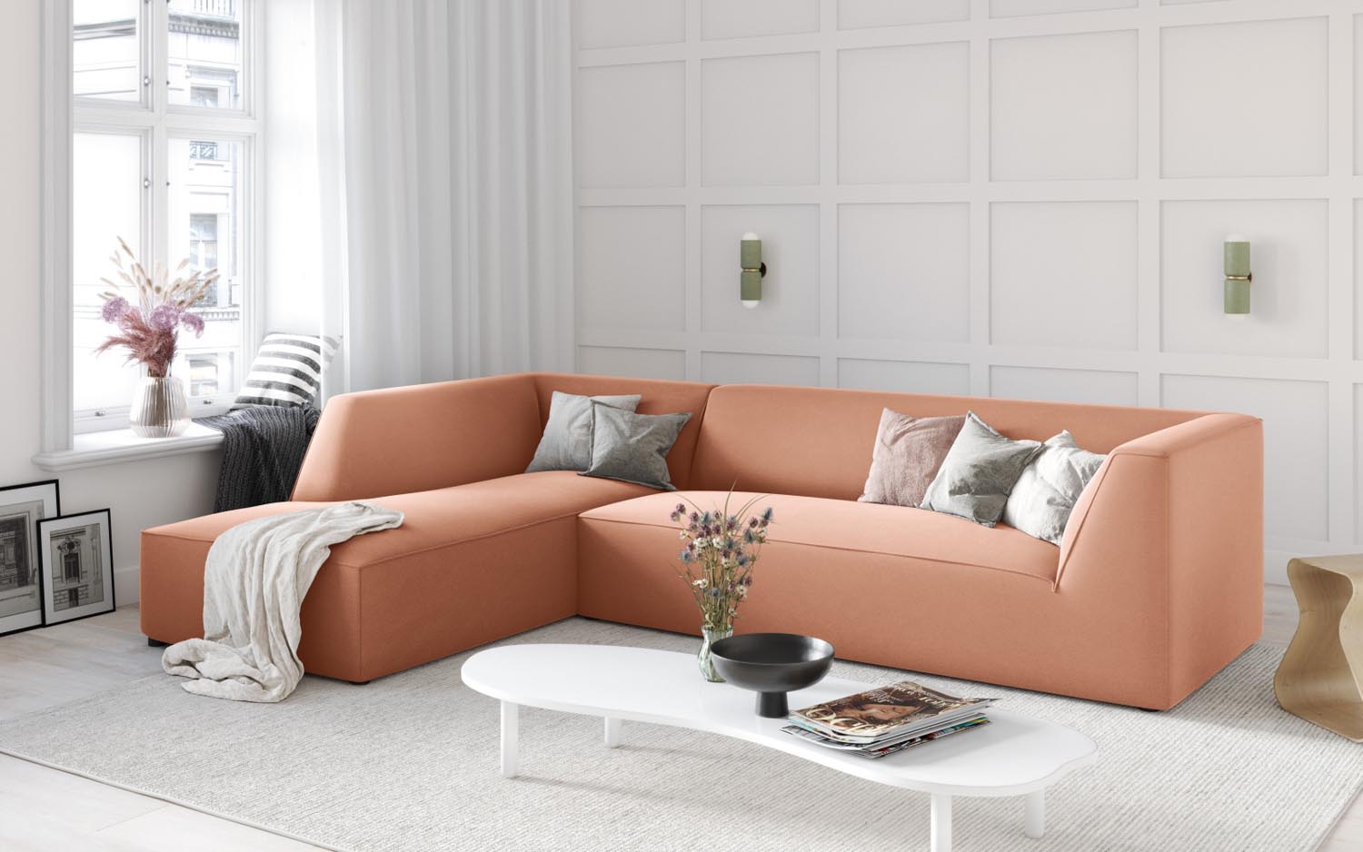Elegantes Ruby Velour Ecksofa in Pink, modulares Design, ideal für stilvolle Wohnräume, präsentiert in einer einladenden Atmosphäre.