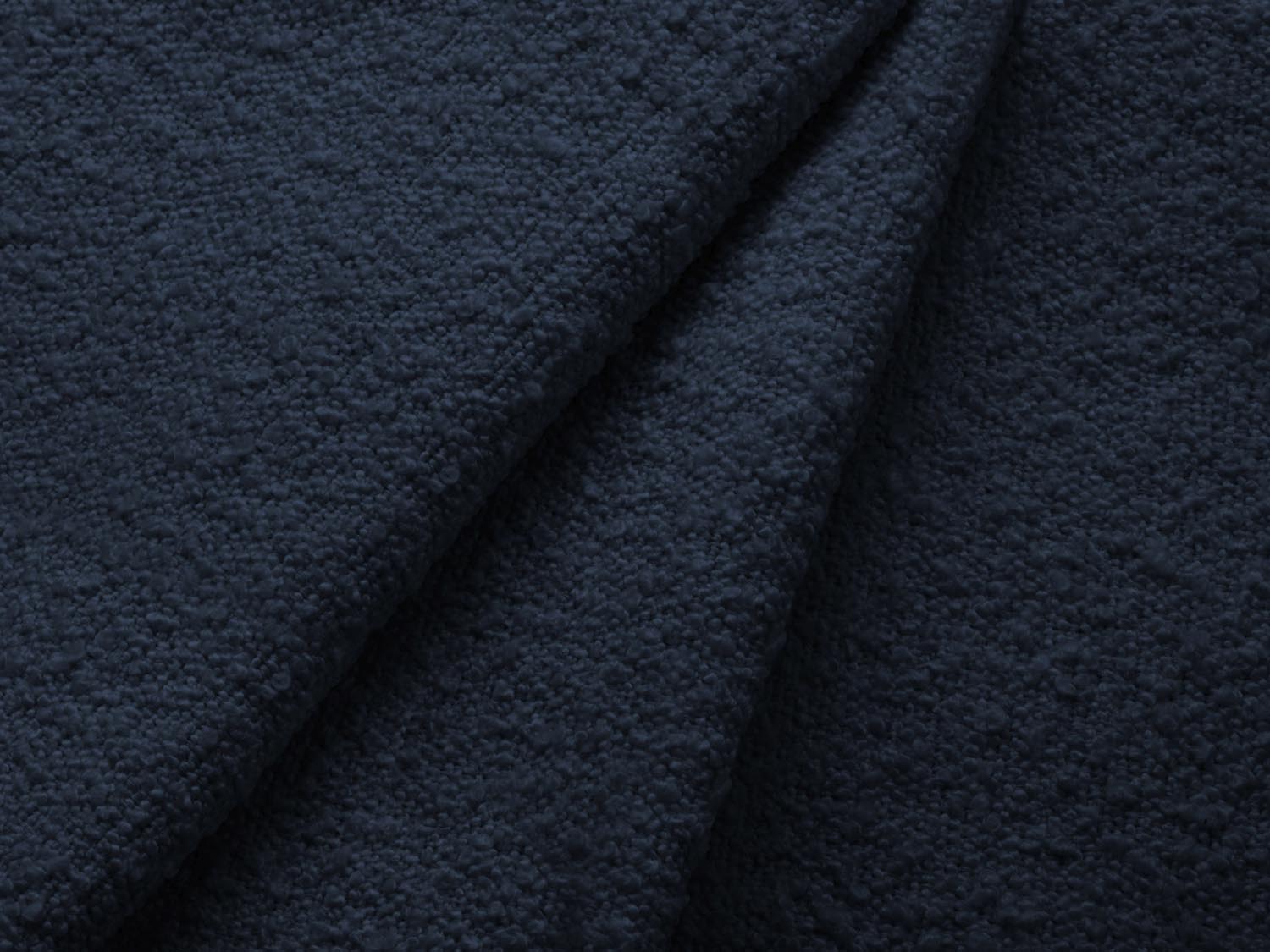 Elegantes Jodie Boucle Ecksofa in dunklem Blau, rechtsseitig, mit praktischer Schlaffunktion und Stauraum für zusätzlichen Komfort.