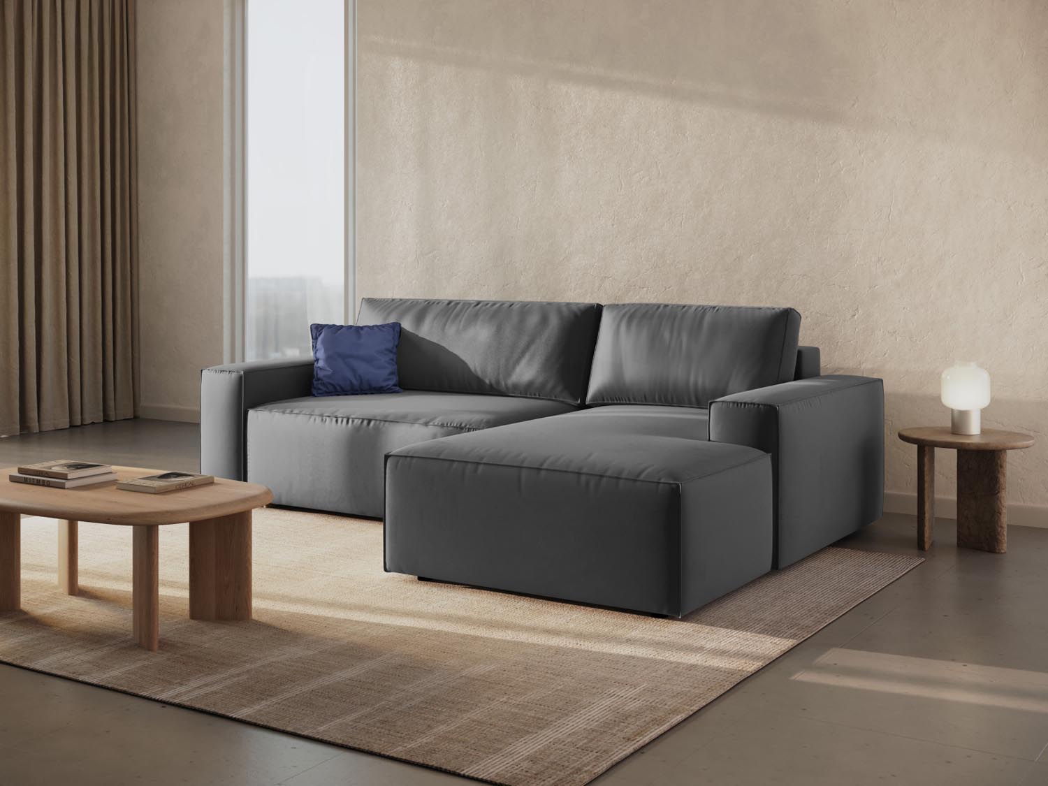 Elegantes Jodie Velour Ecksofa in Grau-Blau, ideal für stilvolle Wohnräume, mit praktischer Schlaffunktion und Stauraum.