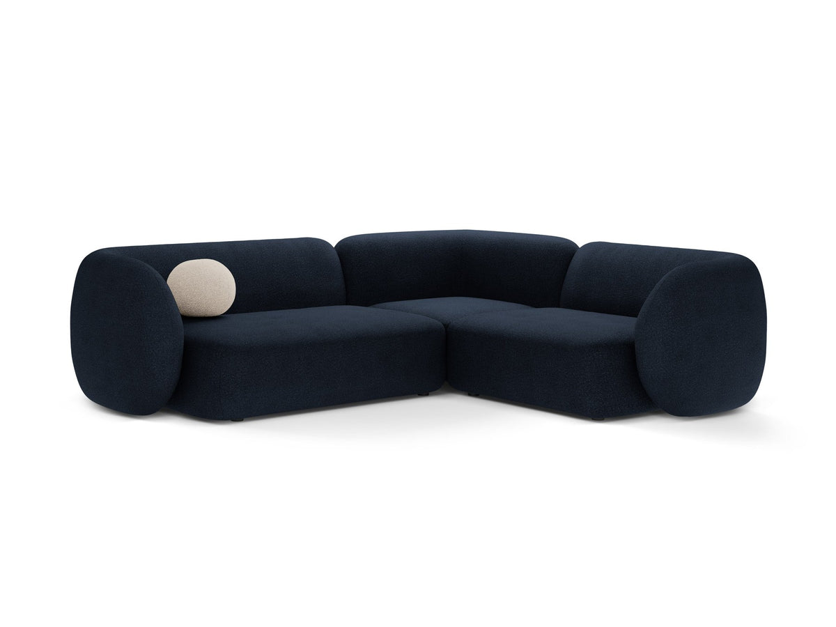 Weisses Ecksofa rechts von Micadoni aus der Kate-Serie mit strukturiertem Bouclé-Stoff, schwarzen Kunststoffbeinen und modularem Aufbau.
