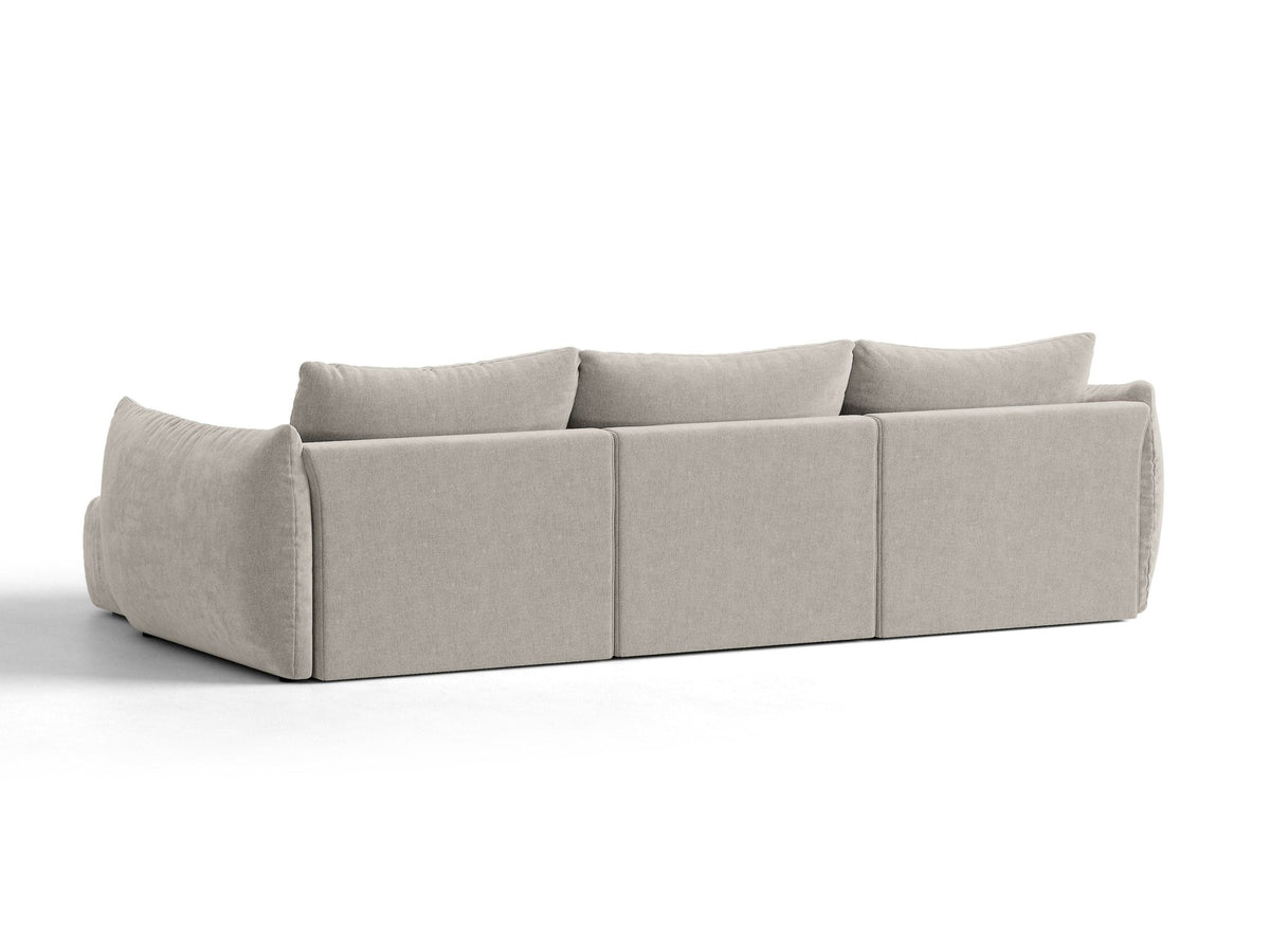 Beiges L-Sofa rechts Bloom von Micadoni mit Veloursstoff-Bezug Casino Pearl, schwarzen Kunststoffbeinen und sichtbarem Staufach unter der Sitzfläche.