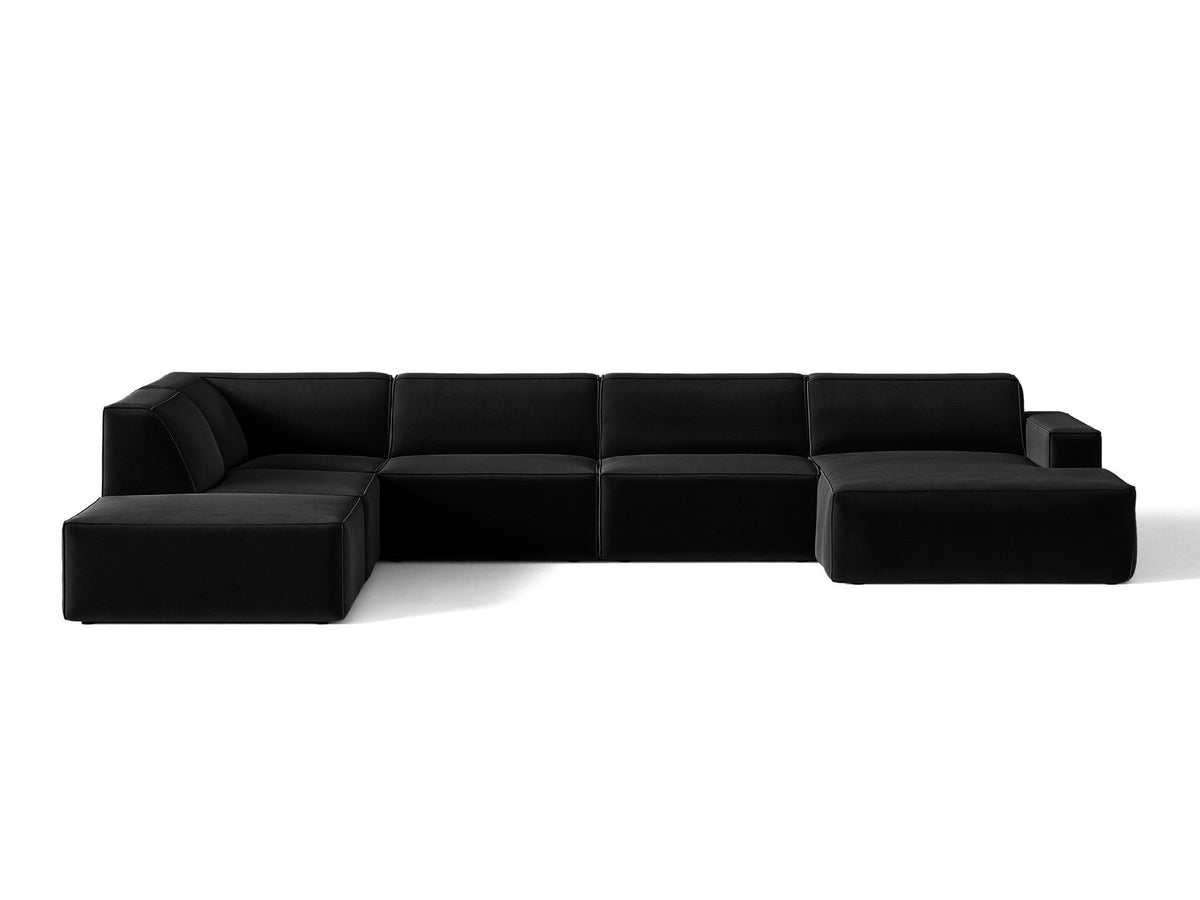 Modulares Ecksofa links Jodie von Micadoni in leichtem Beige mit Venus-Samtstoff, schwarzen Kunststoffbeinen und Panoramaform.