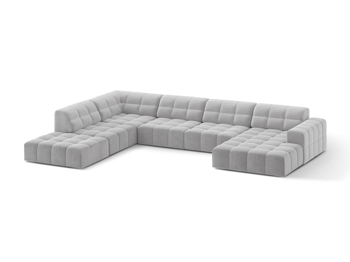 Ecksofa links Jennifer von Micadoni in leichtem Beige mit Bluvel-Stoff, schwarzen Kunststoffbeinen und breiter Sitzfläche.