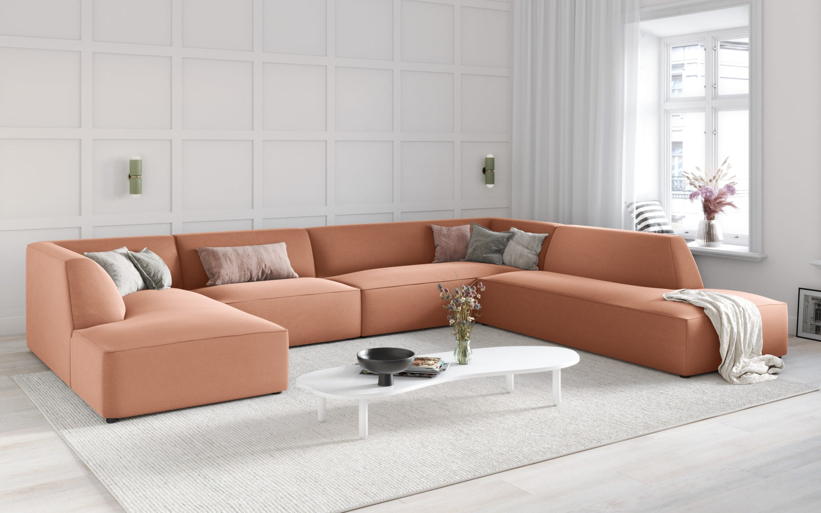 Elegantes Ruby Velour Panoramic Ecksofa in sanftem Pink, ideal für stilvolle Wohnräume. Komfortables 7-Sitzer-Design von Micadoni.