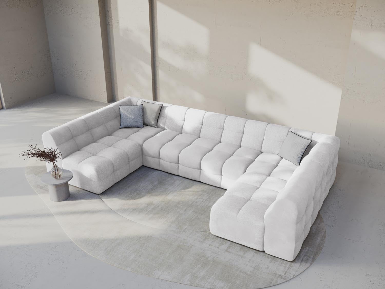 Elegantes Kendal Velour Panoramic Sofa für 7 Personen in sanftem Hellgrau, ideal für stilvolle Wohnräume und gemütliche Abende.