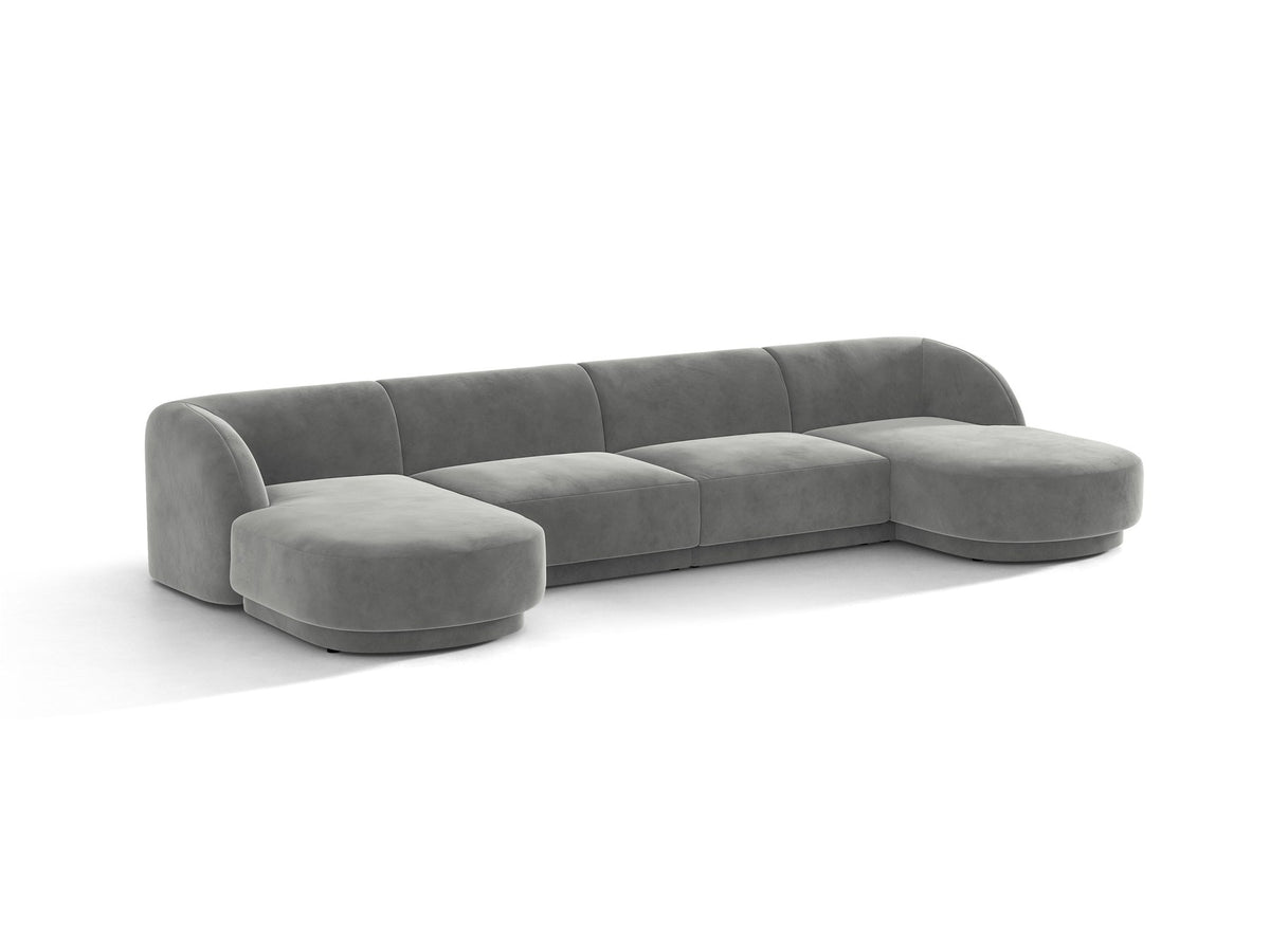 Dunkelbeiges Panorama-Ecksofa Miley von Micadoni mit Bluvel-Stoffbezug, L-Form, schwarzen Kunststoffbeinen und niedriger Rückenlehne.