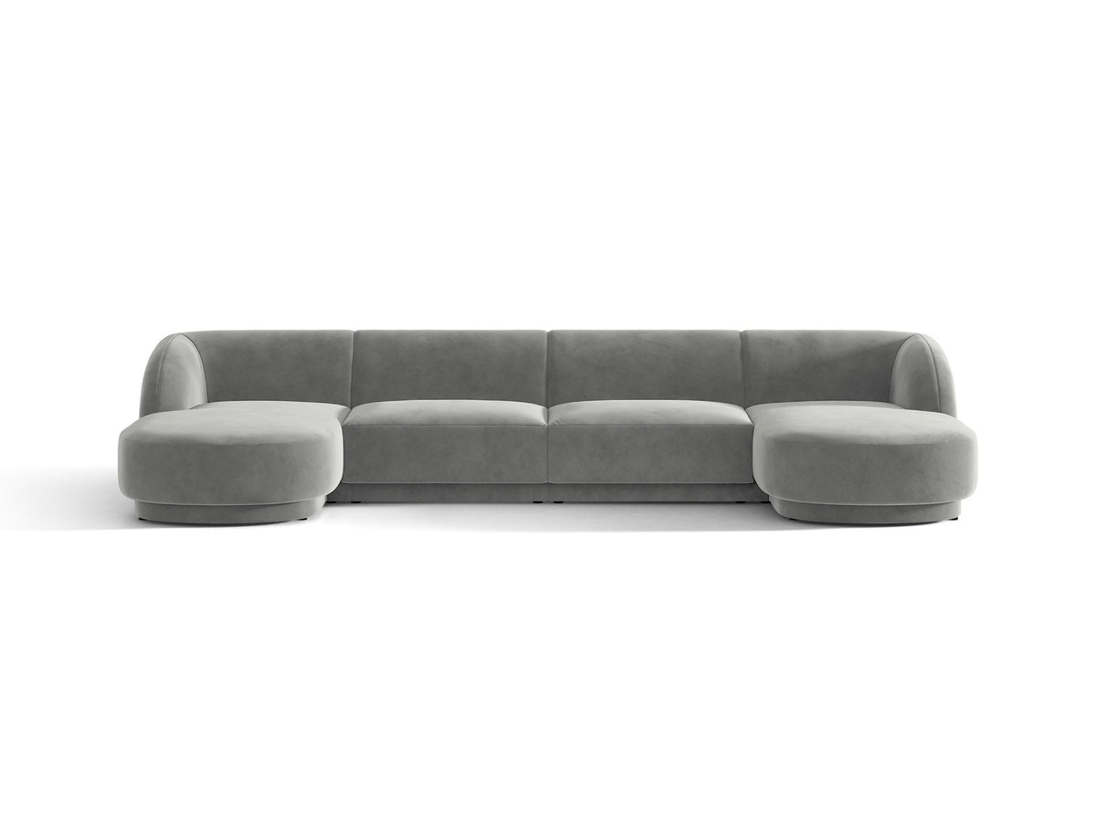 Dunkelbeiges Panorama-Ecksofa Miley von Micadoni mit Bluvel-Stoffbezug, L-Form, schwarzen Kunststoffbeinen und niedriger Rückenlehne.