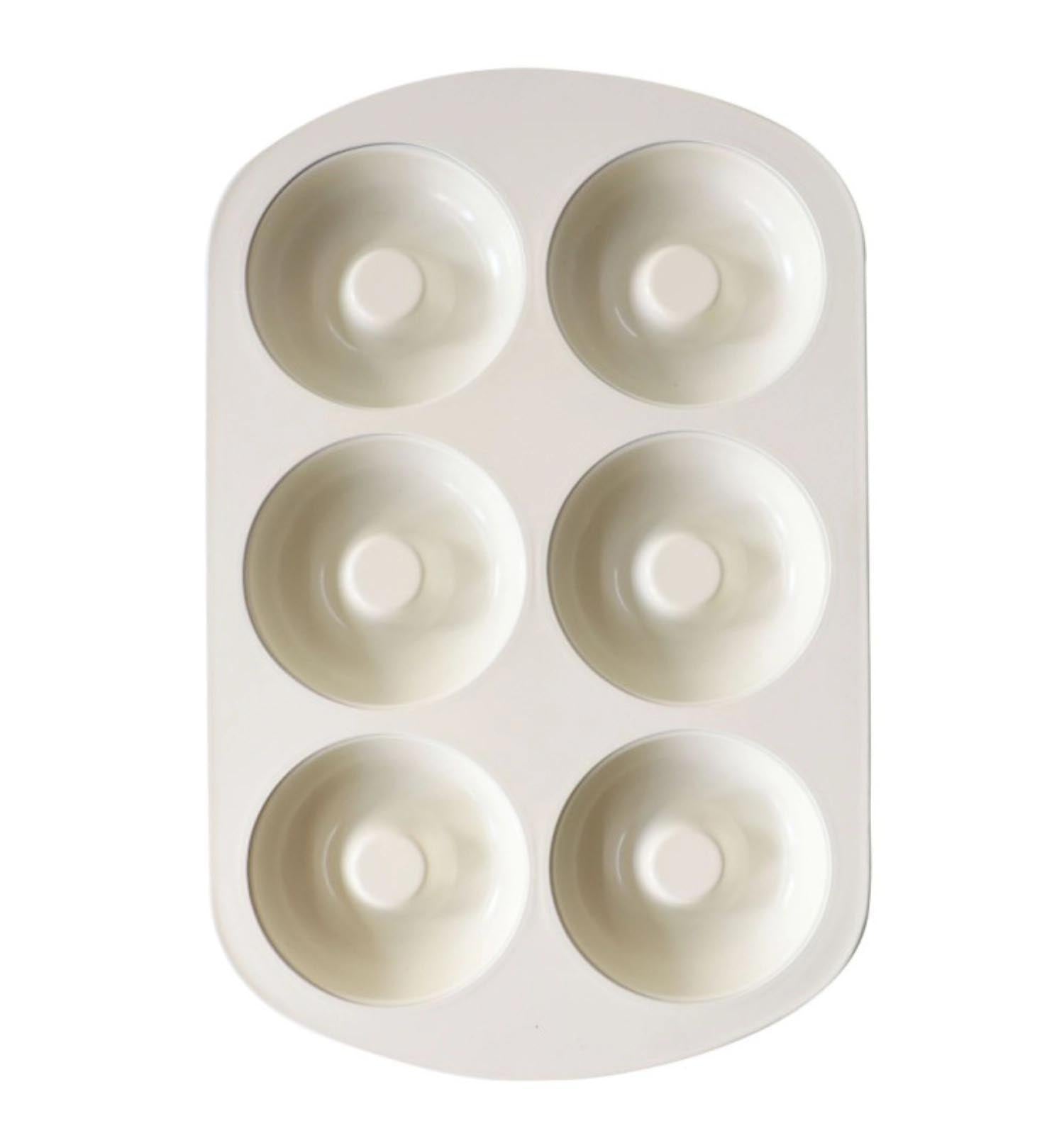 Antihaftbeschichtete Backform für 6 Donuts von Scrap Cooking, ideal für gleichmässiges Backen und einfache Reinigung.