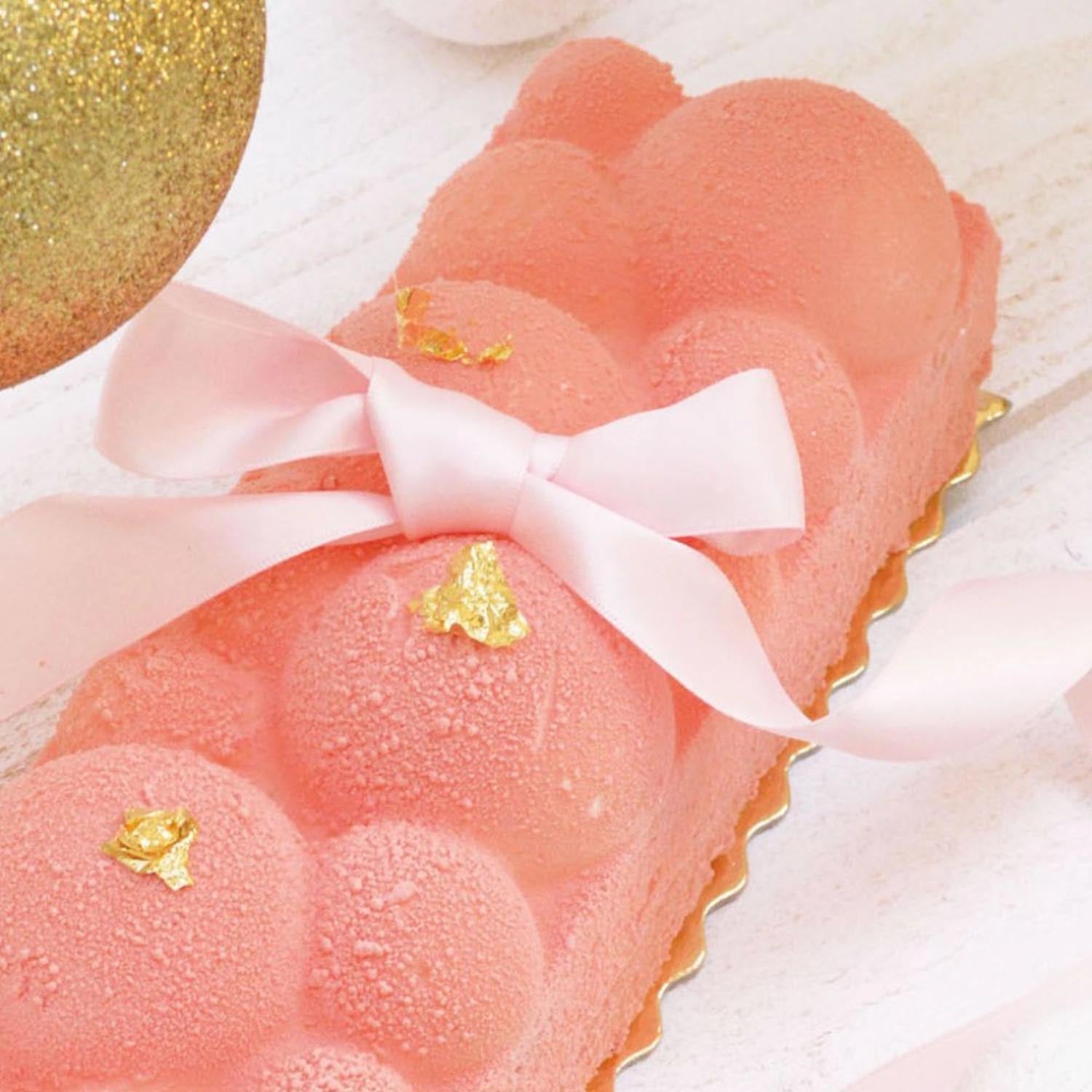 Ein Set aus zwei Bûche Délice Formen von Scrap Cooking, ideal für kreative und köstliche Dessertkreationen.