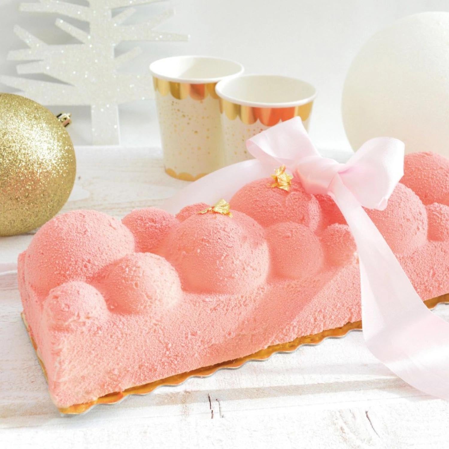 Zwei Bûche Délice Formen von Scrap Cooking für kreative Desserts. Perfekt für festliche und individuelle Backideen.