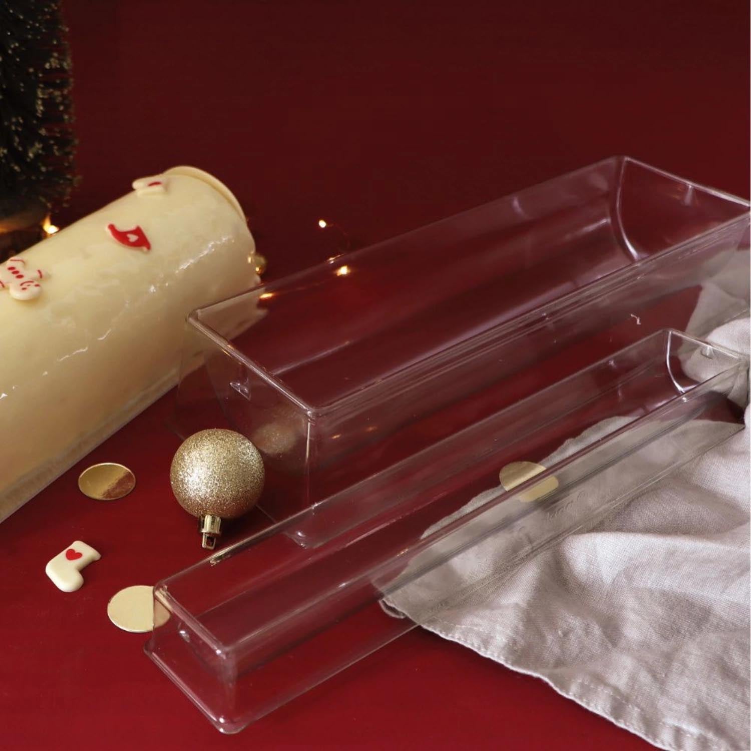 Zwei elegante Bûche Backformen von Scrap Cooking, perfekt für die Zubereitung von köstlichen Kuchen und festlichen Leckereien.