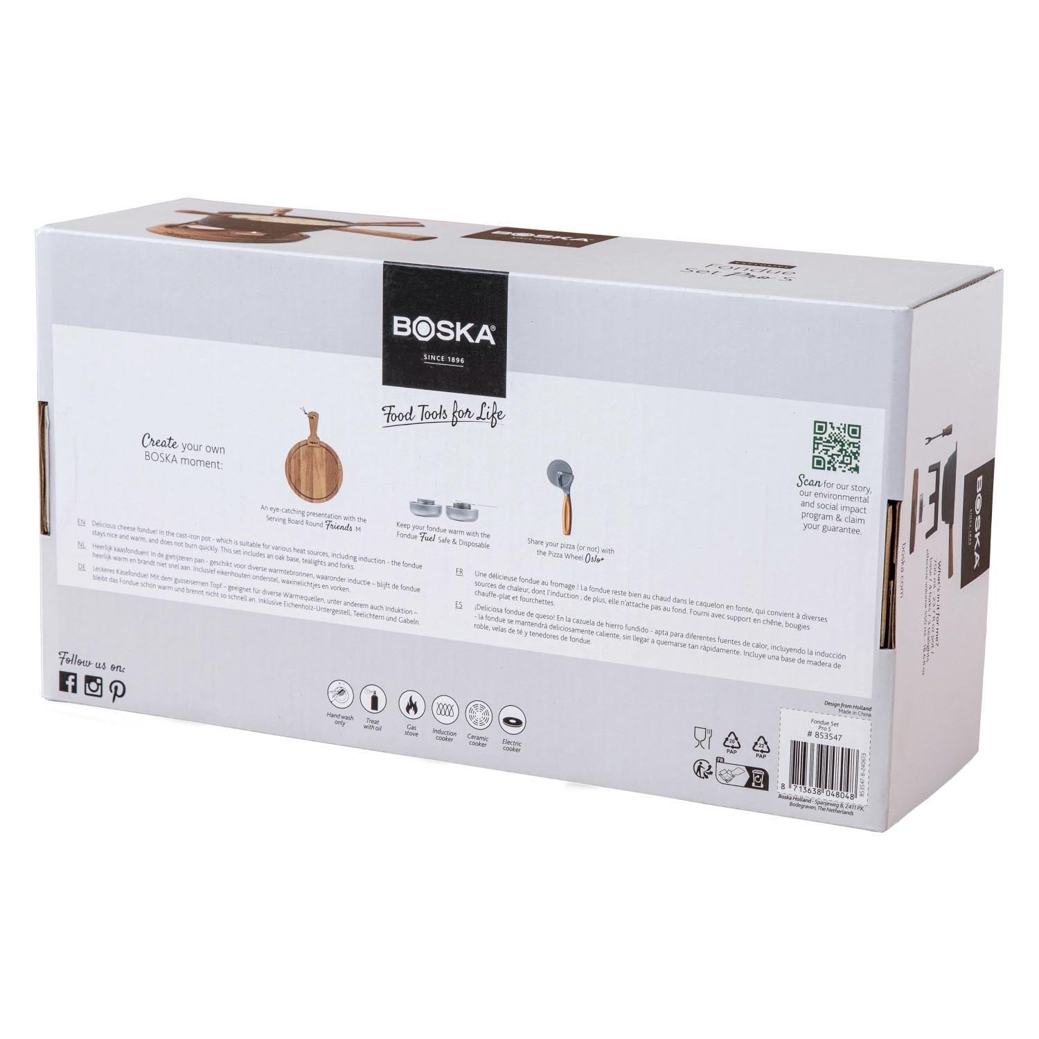 Elegantes Fondueset aus Gusseisen und Eichenholz, ideal für 0.7 Liter Käsefondue. Hochwertig und stilvoll von Boska.