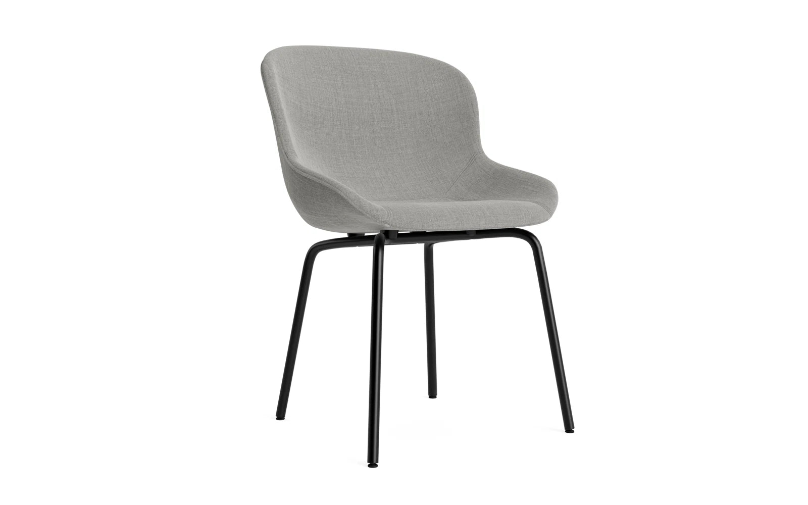 Der Hyg Stuhl von Normann Copenhagen vereint dänische Hygge mit sanften Linien und gemütlicher Polsterung. Wählbar in Stoff oder Leder.