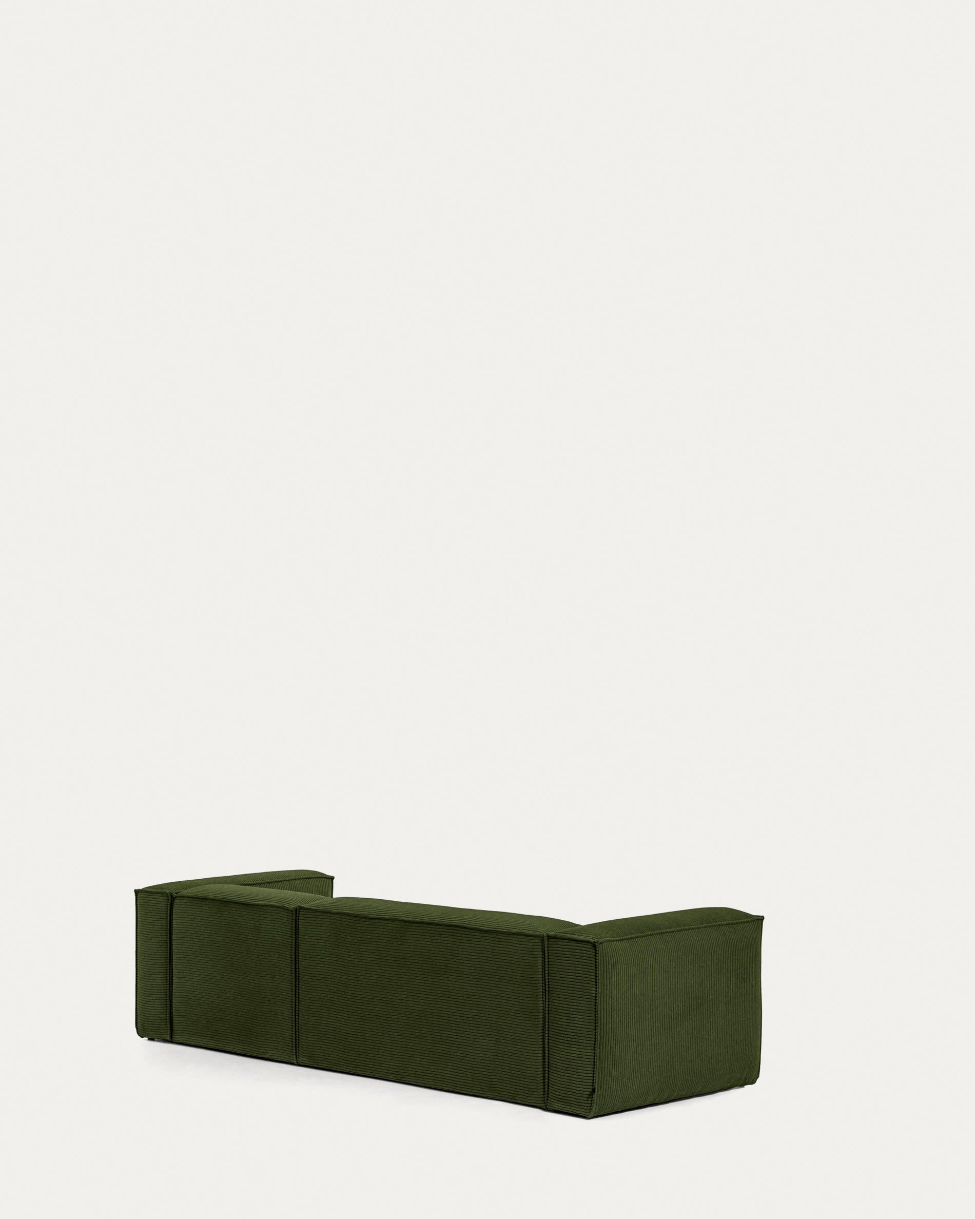 Das grüne Blok 3-Sitzer-Sofa mit rechter Chaiselongue (300 cm) aus breitem Cord vereint Komfort und nachhaltiges Design.