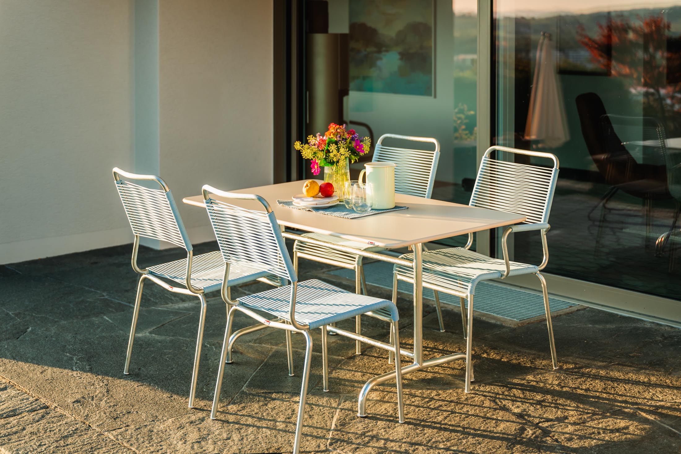 Rigi Spaghetti-Gartenstuhl ohne Armlehne Comfort in Pastellblau präsentiert im Onlineshop von KAQTU Design AG. Gartenstuhl ist von Schaffner