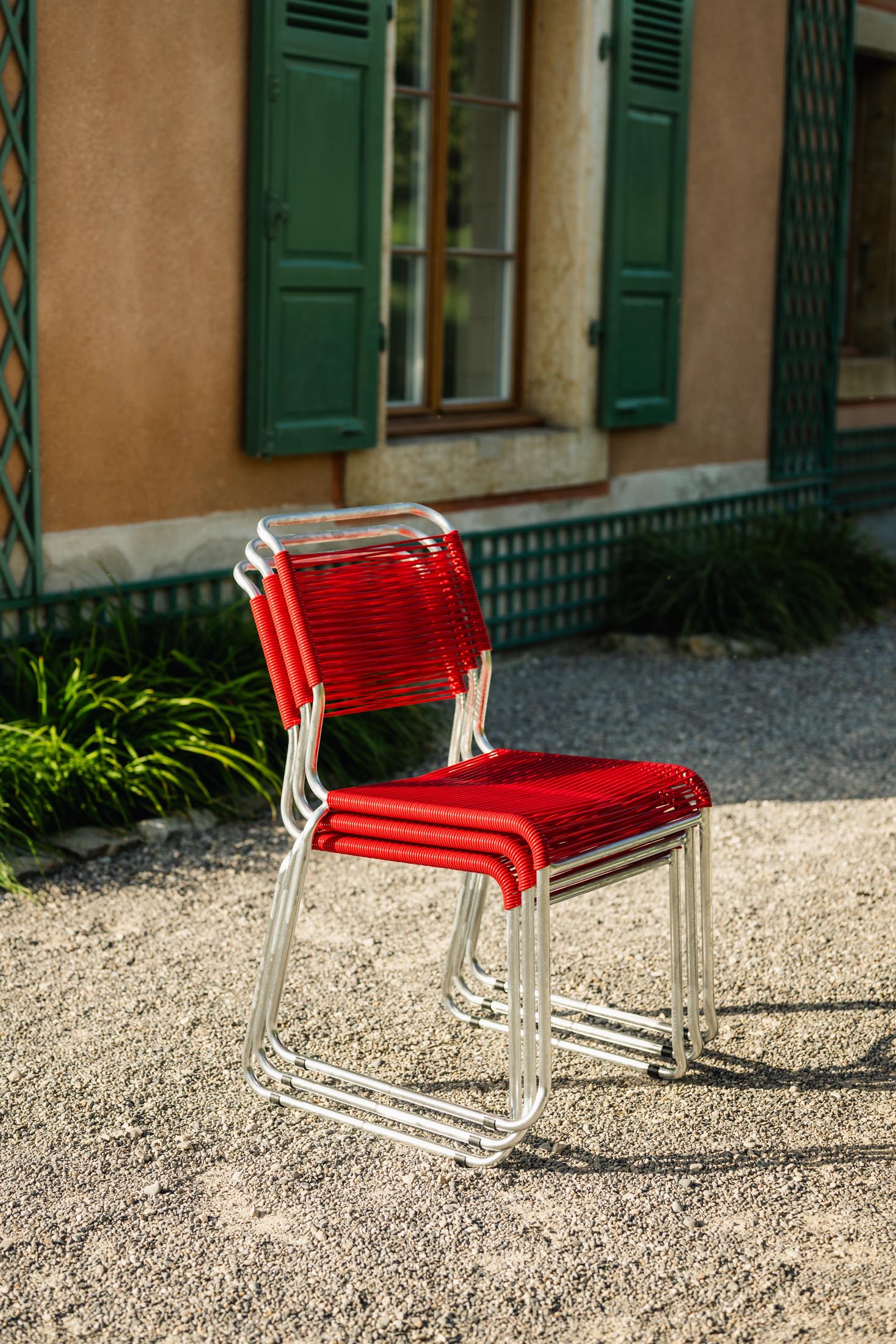 Spaghettistuhl Säntis mit Kufen in Rot präsentiert im Onlineshop von KAQTU Design AG. Gartenstuhl ist von Schaffner