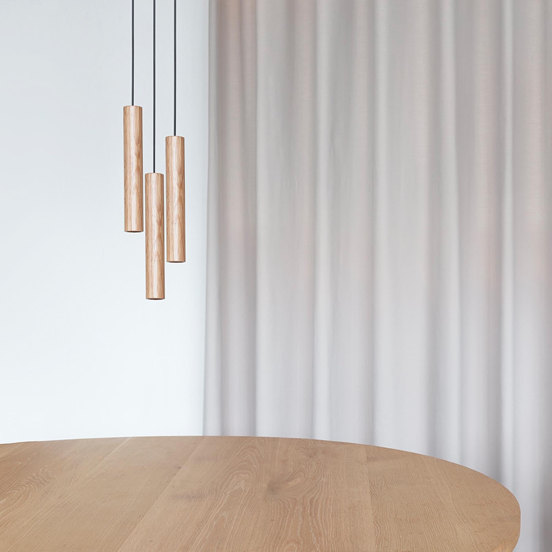 Elegante Chimes Pendelleuchte in einer stilvollen 3er Gruppe, gefertigt von Umage, ideal für moderne Wohnräume.