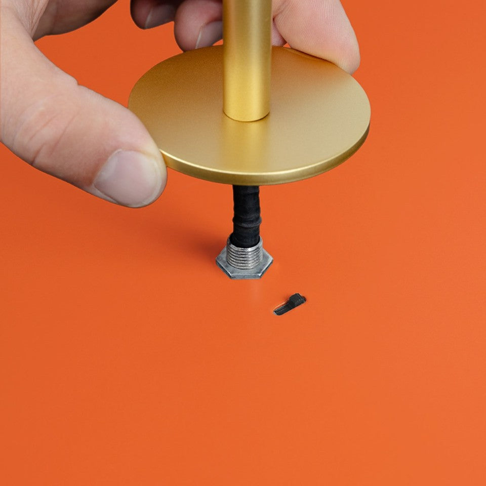 Elegante Asteria Plus Mini Pendellampe in warmem Orange, ideal für stimmungsvolle Beleuchtung in modernen Wohnräumen.