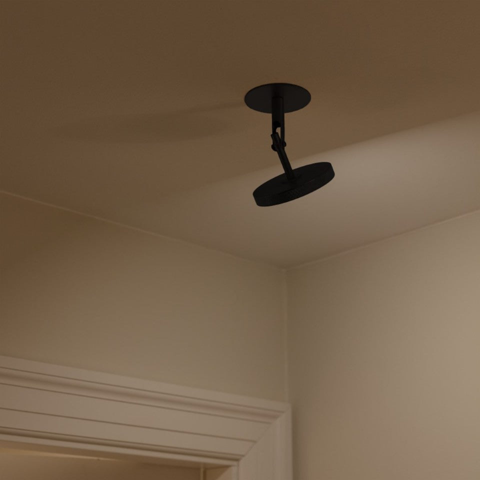 Moderne Asteria Spot Wandleuchte in elegantem Schwarz, perfekt für stimmungsvolle Akzente und zeitgemäße Raumgestaltung.