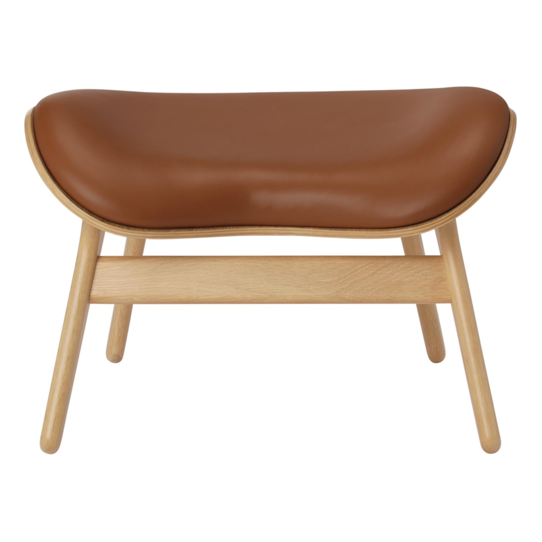 Eleganter Ottoman in warmem Cognac, ideal für stilvolle Wohnräume und als auffälliges Designelement für jedes Zuhause.