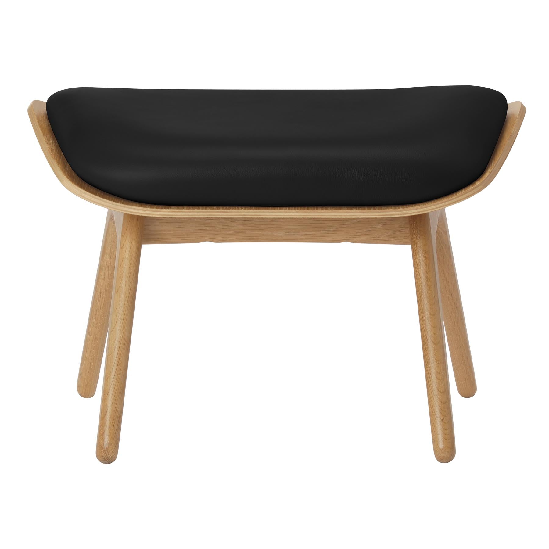 Eleganter schwarzer Reader Ottoman von Umage, ideal für stilvolle Wohnräume und gemütliche Leseecken.
