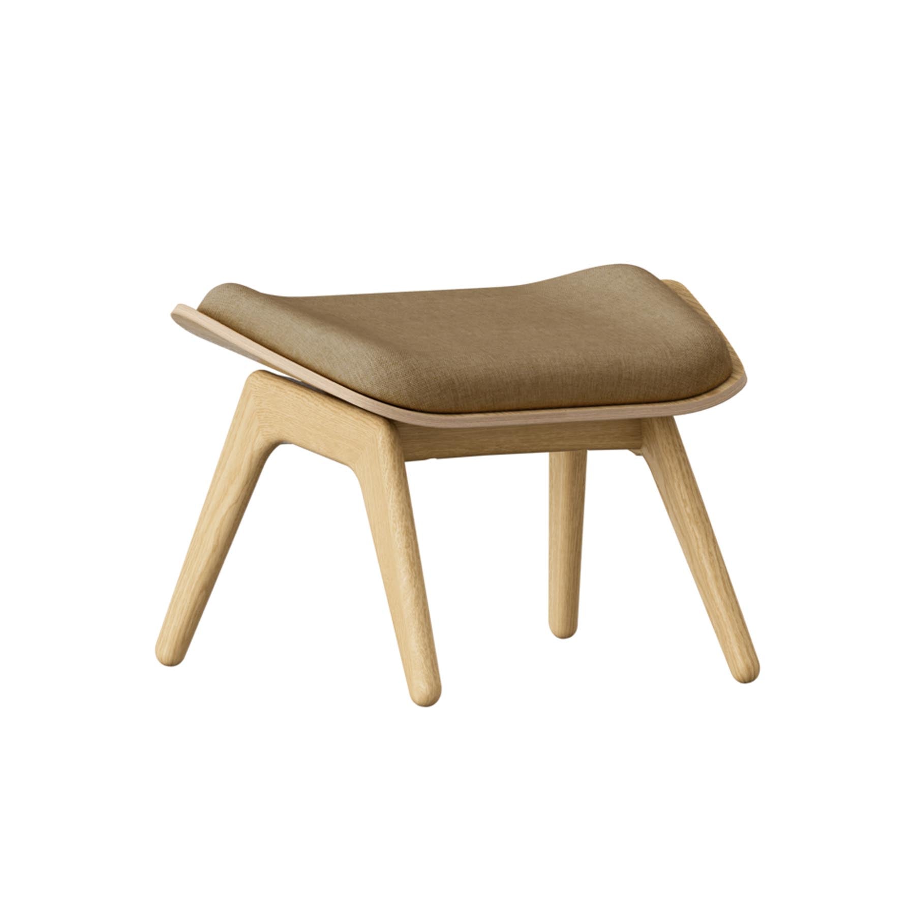 Der Reader Ottoman von Umage in modernem Design, perfekt als stilvolle Sitzgelegenheit oder Fußablage für jedes Wohnzimmer.