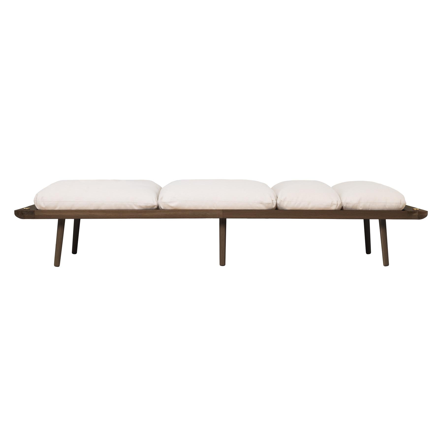 Elegantes Tagesbett in sanften Weißtönen, ideal für entspannende Momente und stilvolle Einrichtungsideen.