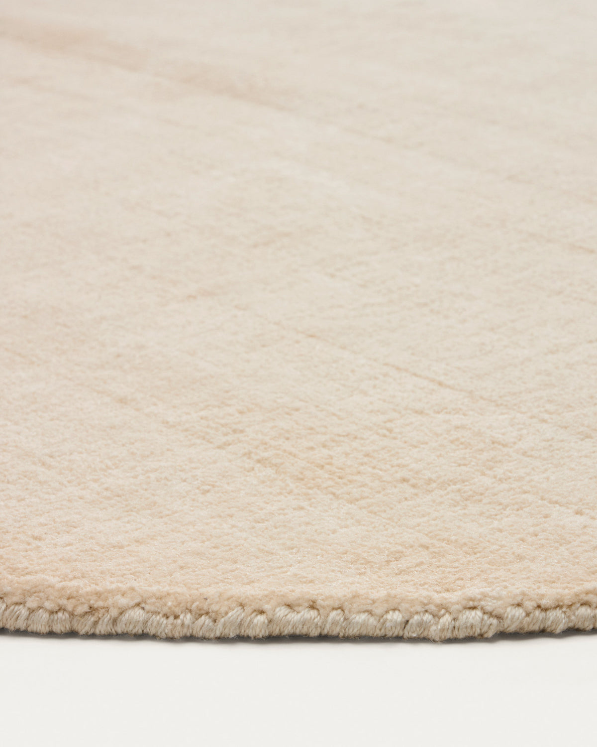 Runder Teppich Empuries in Naturweiss Ø 200 cm in Weiss präsentiert im Onlineshop von KAQTU Design AG. Teppich ist von Kave Home