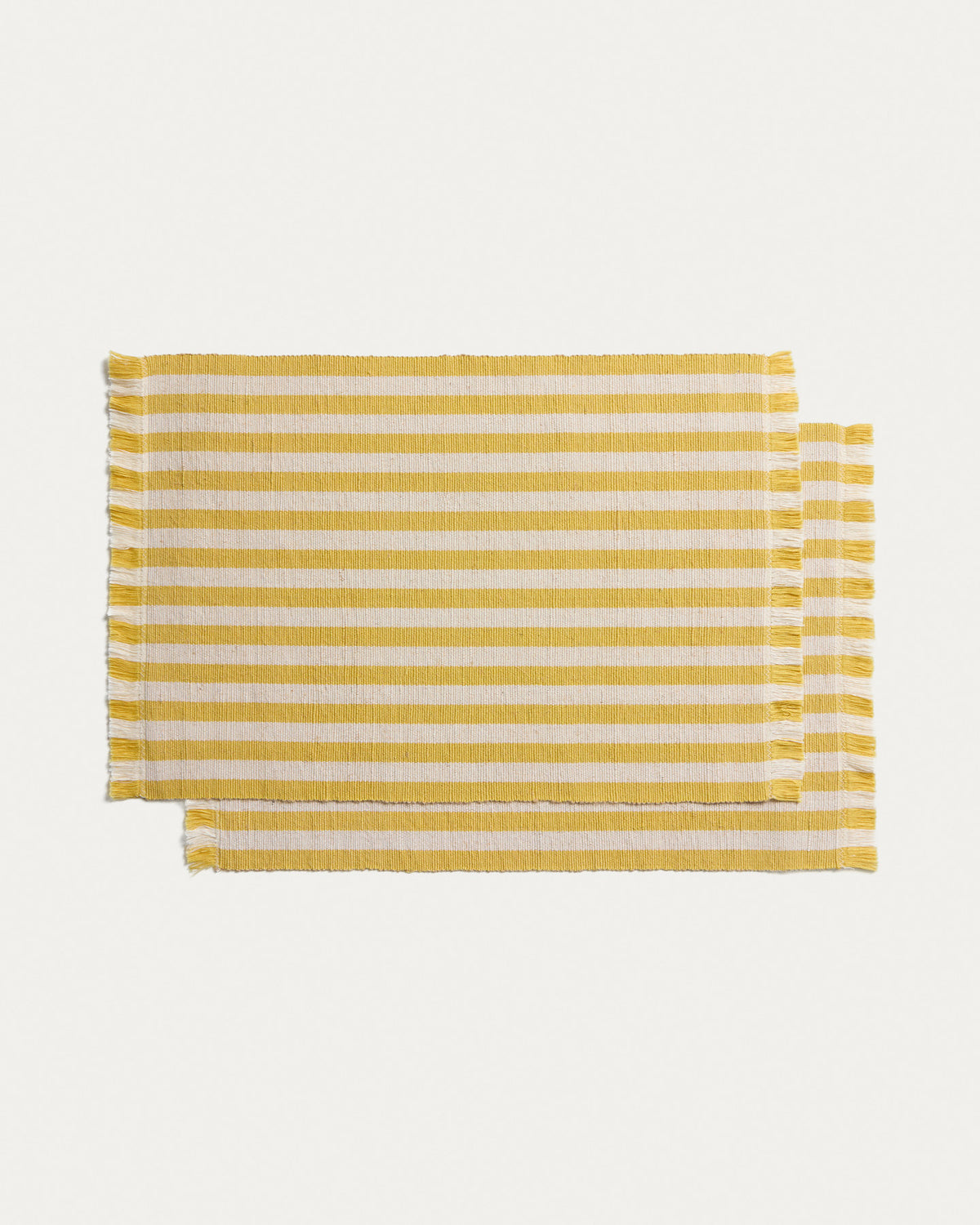 Set Daltan mit 2 Tischsets aus Baumwolle und Jute, gelb gestreift, 35 x 50 cm in Gelb präsentiert im Onlineshop von KAQTU Design AG. Tischset ist von Kave Home