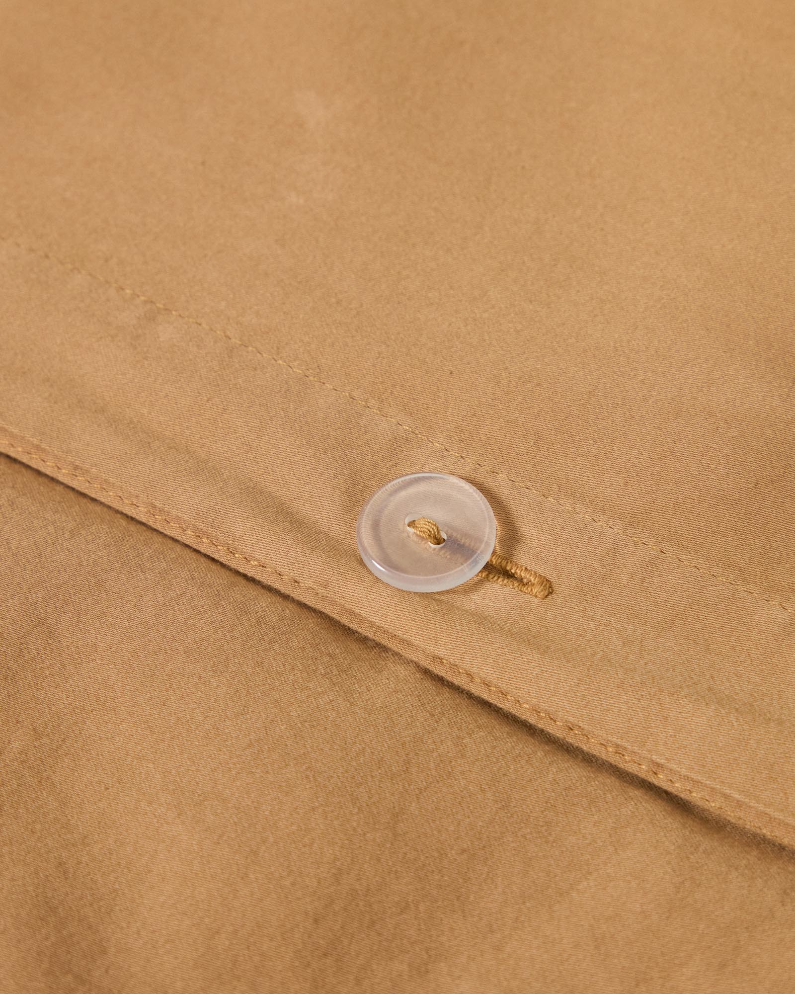 Luxuriöser Duvetbezug Sirale aus 100 % Baumwollsatin in stilvollem Kupfer, perfekt für 180-cm-Betten, mit sanftem Washed-Finish.