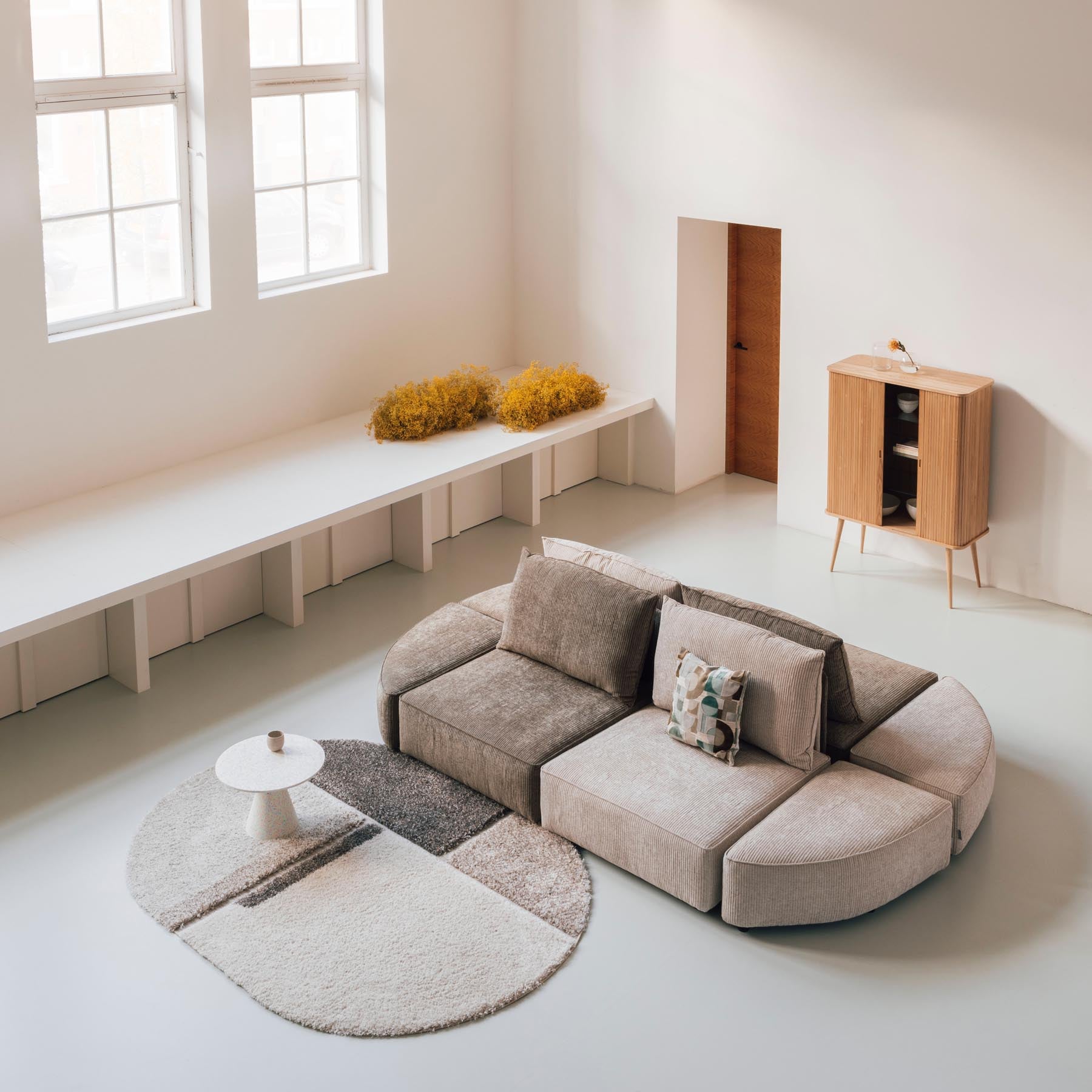 Sofa Element Hunter Pie Pouf links in Sand präsentiert im Onlineshop von KAQTU Design AG. Modulares Sofa ist von Zuiver