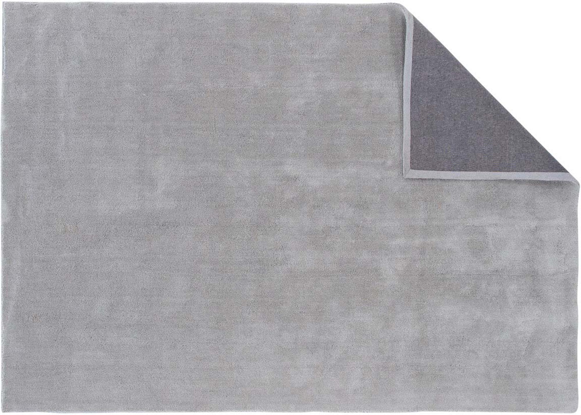 Eleganter Teppich 200 x 300 cm in sanften Farben, ideal für stilvolle Wohnräume und gemütliche Atmosphäre.