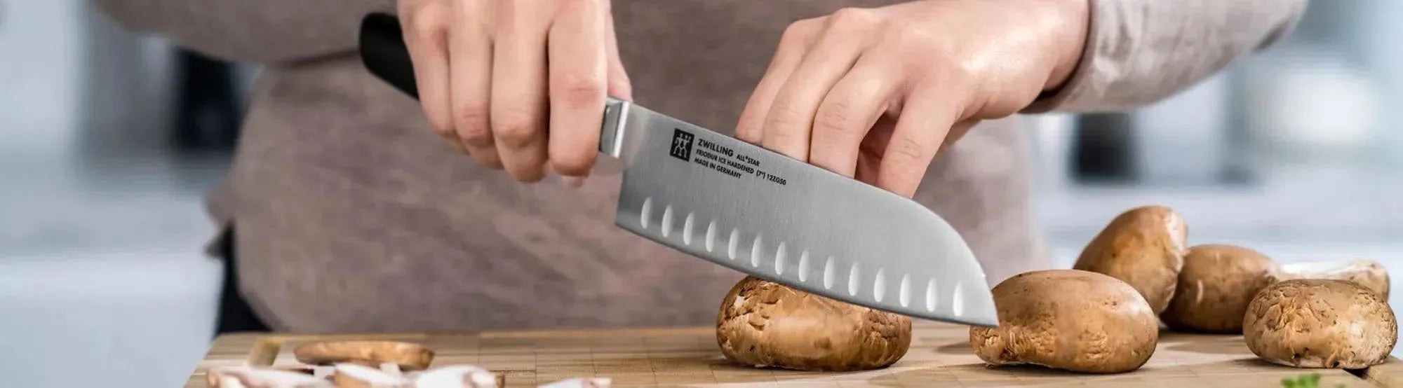 Zwilling All-Star Messer: Präzision für Profis, Edelstahlklingen, ergonomische Griffe und vielseitige Koch-, Santoku- und Gemüsemesser.