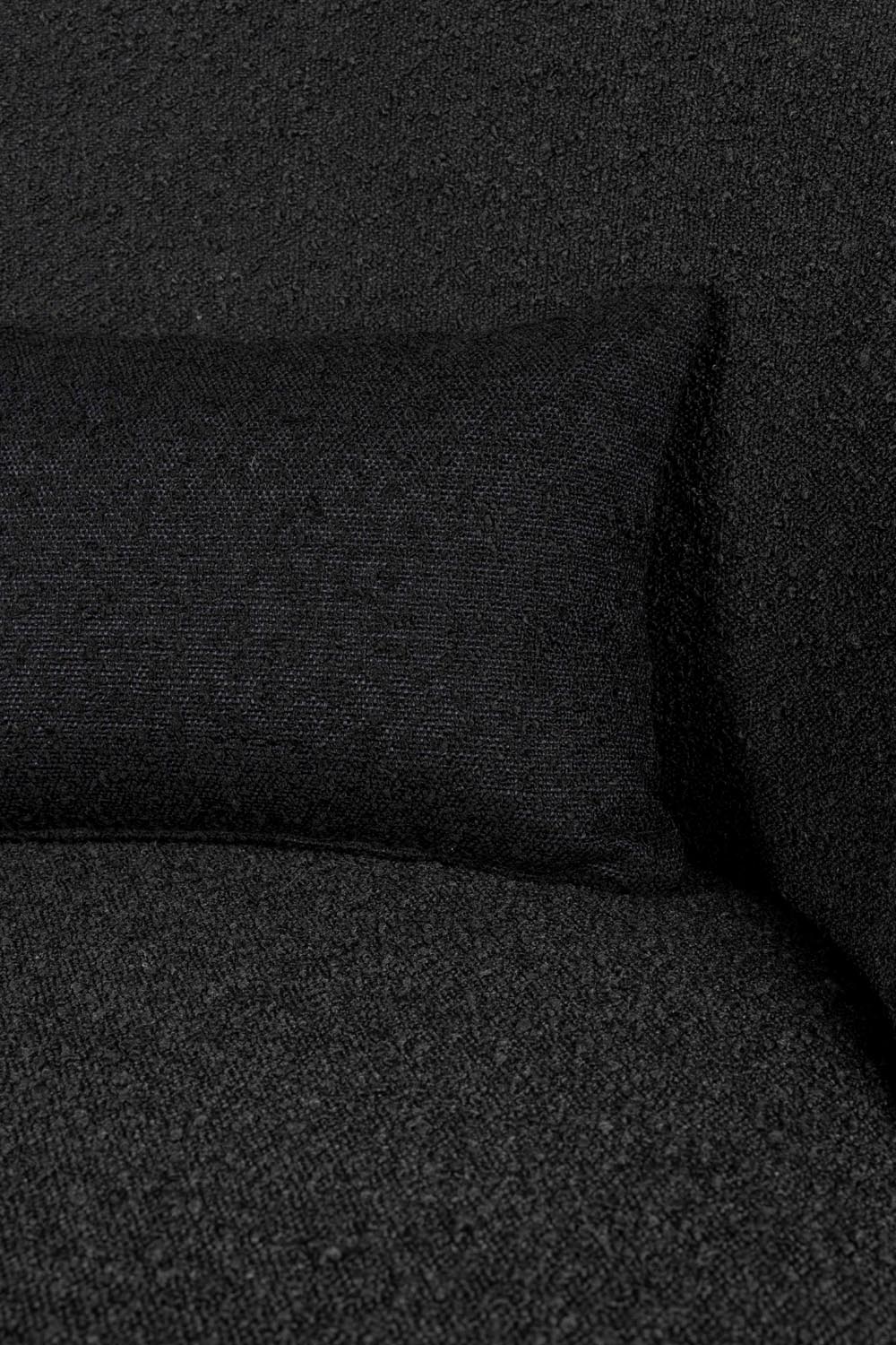 Loungesessel Rodin Bouclé in Schwarz präsentiert im Onlineshop von KAQTU Design AG. Sessel ist von Dutchbone