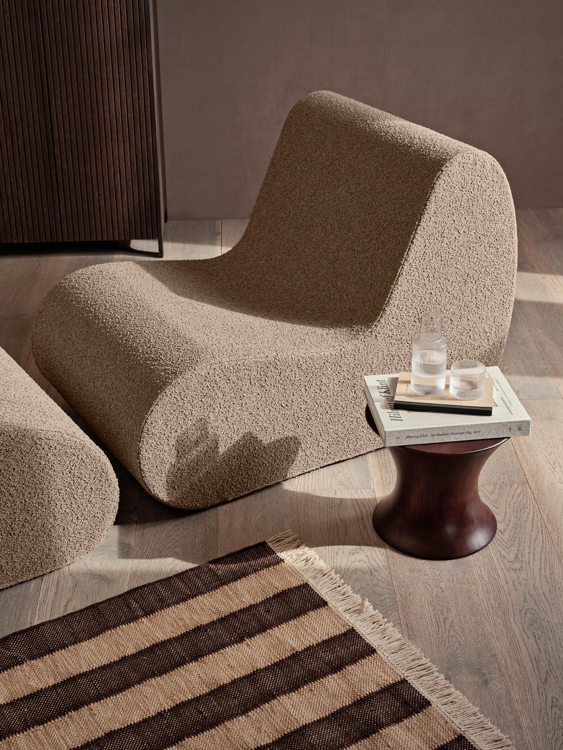 Elegantes Rouli Modul in Bouclé: Komfort, Flexibilität und modernes Design für drinnen und draussen.