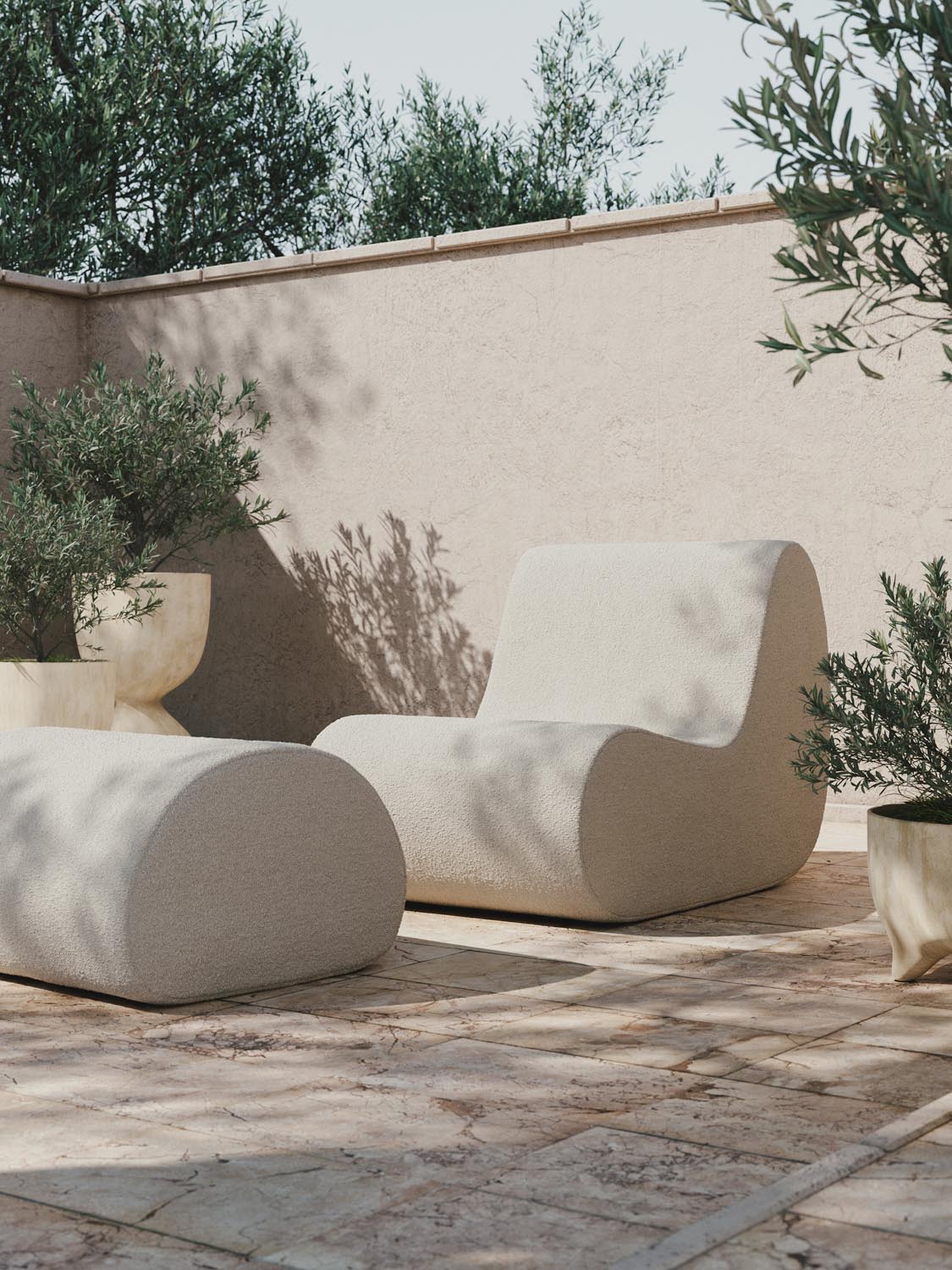 Eleganter Bouclé-Pouf von Ferm Living für stilvolle Akzente.