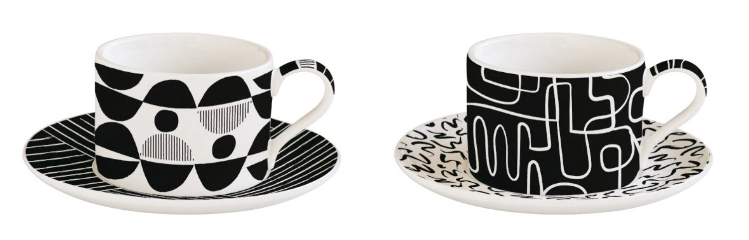 Elegantes Set aus zwei Kaffeetassen mit passenden Untertassen im modernen Grafikdesign, perfekt für jeden Kaffeegenuss und stilvolle Anlässe.