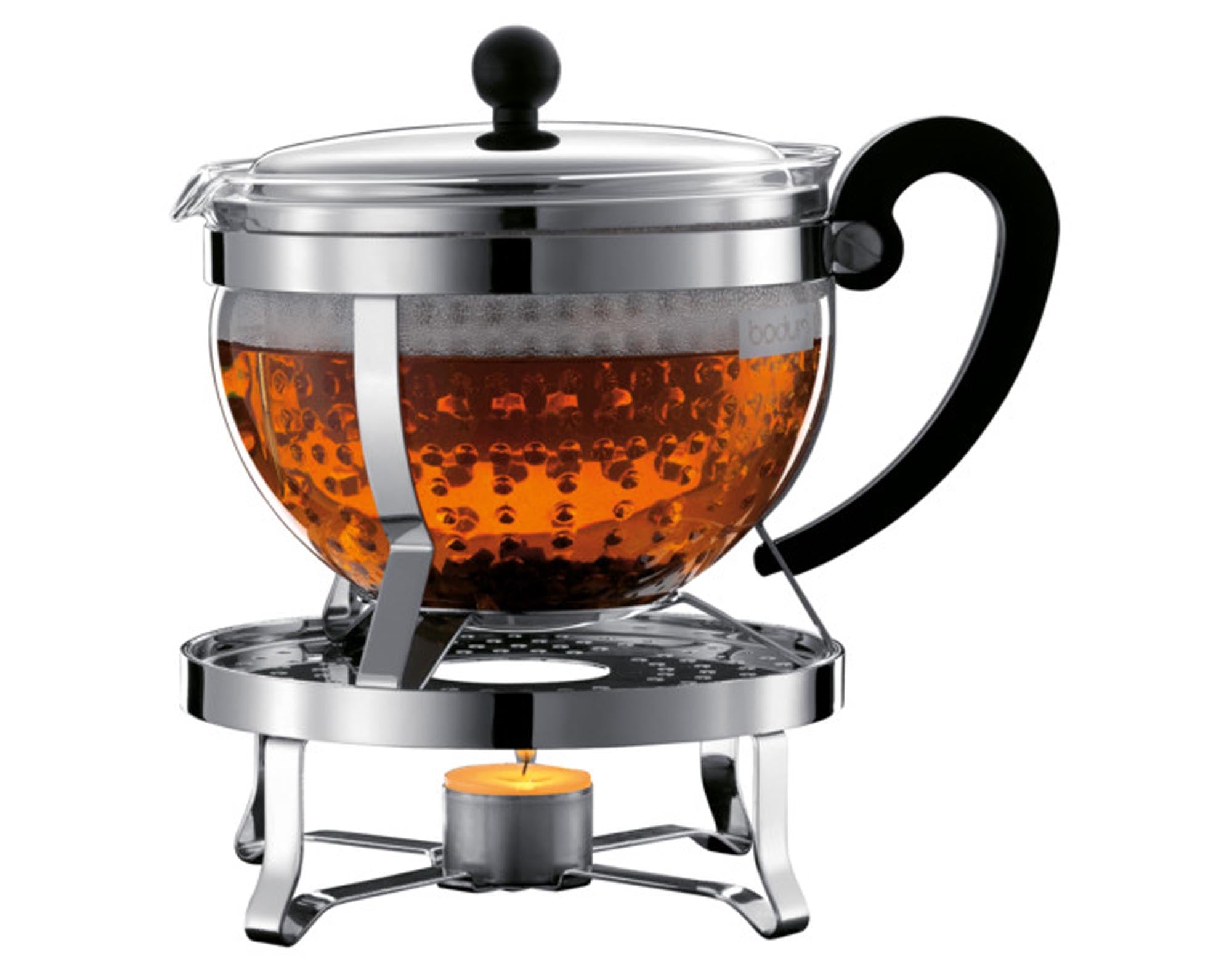Stilvolle BODUM Teekanne Chambord 1.3 l mit Rechaud, Borosilikatglas, Edelstahlrahmen, ideal für Teeliebhaber.