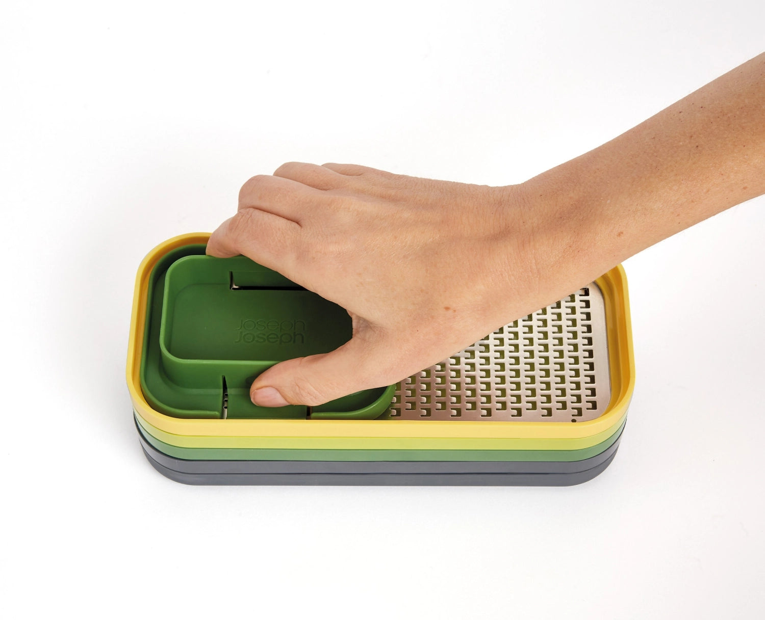 Multicolor Multi-Prep Kompakt 4tlg. Vorbereitungsset von Joseph Joseph, ideal zum Reiben und Raffeln von Lebensmitteln, platzsparend und vielseitig.