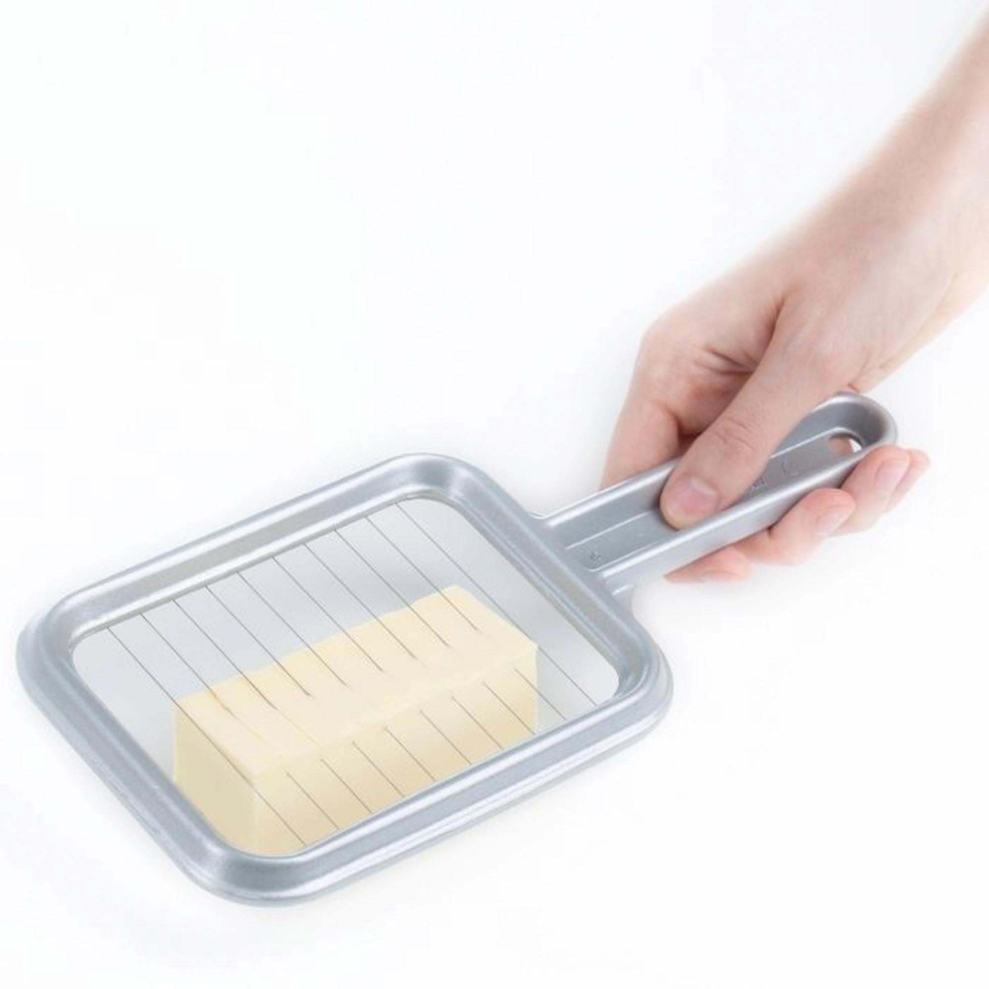 Butterteiler Portionetto von Westmark, perfekt für exaktes Portionieren von Butter, Maße: 25,5x11,5x1,3 cm, langlebig und benutzerfreundlich.