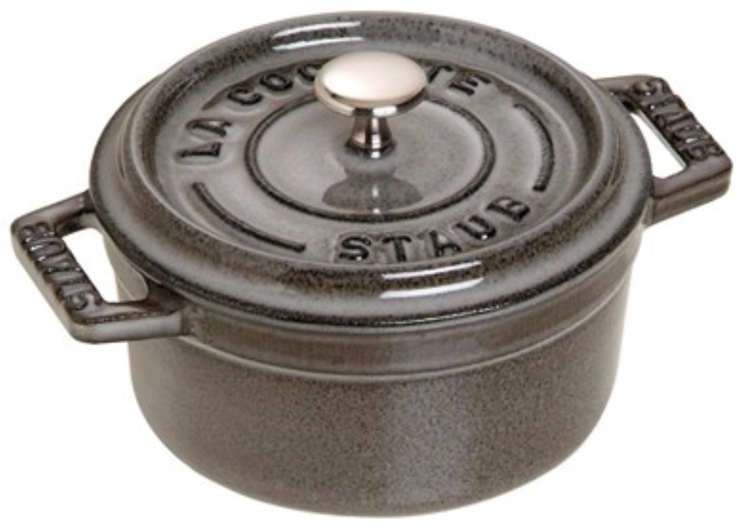 Kleine runde Cocotte von Staub mit 0.25l Volumen, ideal für persönliche Gerichte, stilvolles Design für kulinarische Experimente.