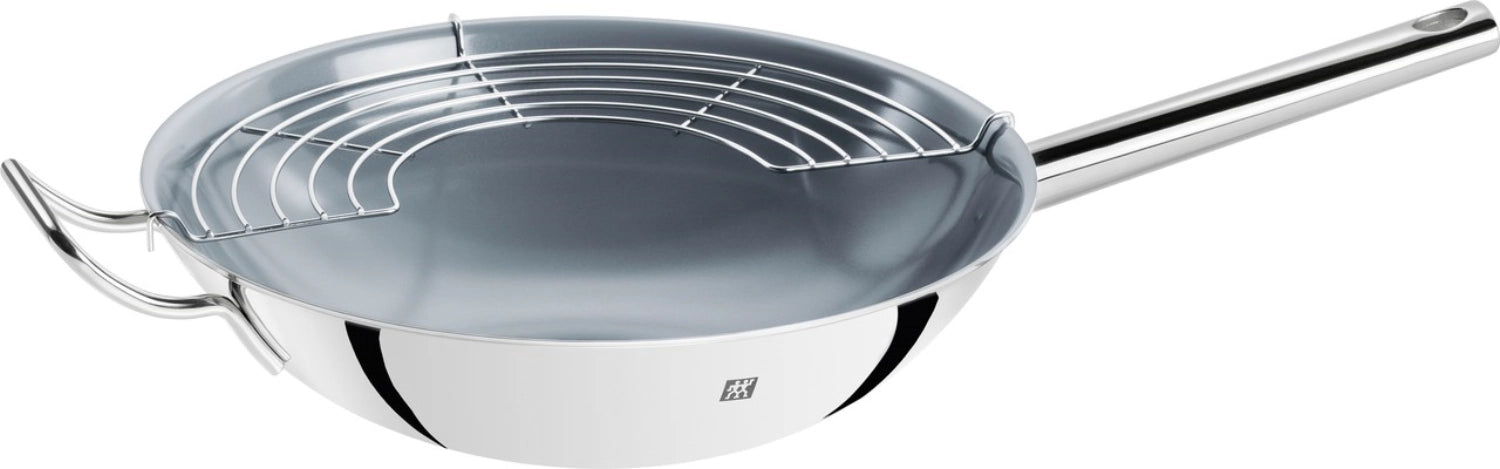 Eleganter Zwilling Plus Wok mit 32 cm Durchmesser, ideal für kreative Kochabenteuer und gesunde, fettarme Zubereitung asiatischer Speisen.